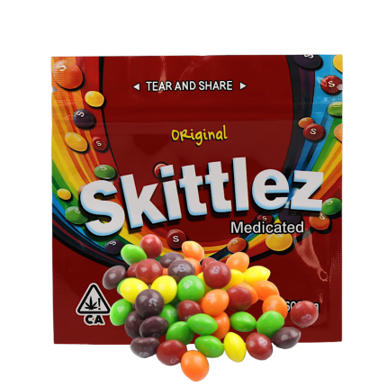 Pack of Skittles Original rainbow chewy candies with assorted fruit-flavoured colourful sugar-coated pieces.
